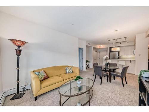 1201-175 Silverado Boulevard Sw, Calgary, AB - Indoor Photo Showing Living Room