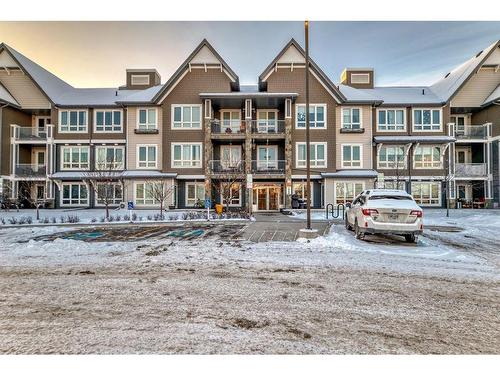 1201-175 Silverado Boulevard Sw, Calgary, AB - Outdoor With Balcony With Facade