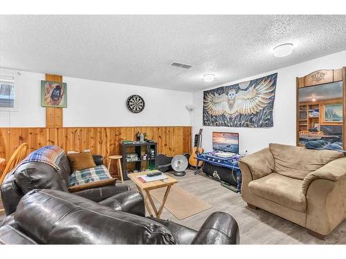 207 Fallswater Road Ne, Calgary, AB - Indoor Photo Showing Living Room