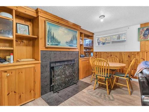 207 Fallswater Road Ne, Calgary, AB - Indoor With Fireplace