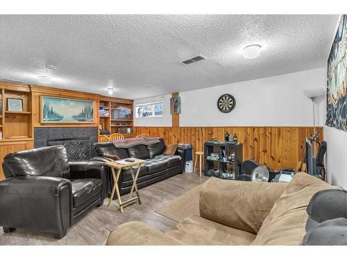 207 Fallswater Road Ne, Calgary, AB - Indoor Photo Showing Living Room