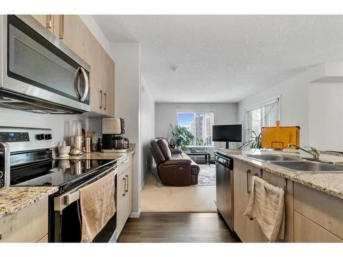 3324-4641 128 Avenue Ne, Calgary, AB - Indoor Photo Showing Kitchen With Double Sink