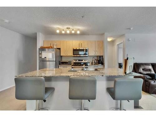 3324-4641 128 Avenue Ne, Calgary, AB - Indoor Photo Showing Kitchen With Stainless Steel Kitchen