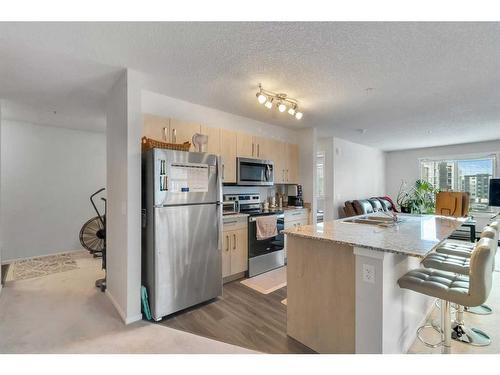 3324-4641 128 Avenue Ne, Calgary, AB - Indoor Photo Showing Kitchen With Stainless Steel Kitchen