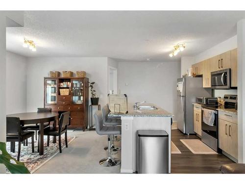 3324-4641 128 Avenue Ne, Calgary, AB - Indoor Photo Showing Kitchen With Stainless Steel Kitchen