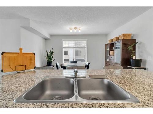 3324-4641 128 Avenue Ne, Calgary, AB - Indoor Photo Showing Kitchen With Double Sink