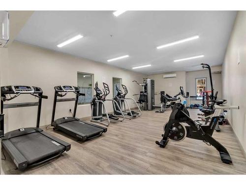 3324-4641 128 Avenue Ne, Calgary, AB - Indoor Photo Showing Gym Room