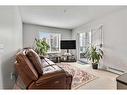 3324-4641 128 Avenue Ne, Calgary, AB  - Indoor Photo Showing Living Room 