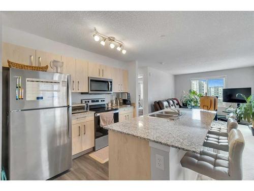 3324-4641 128 Avenue Ne, Calgary, AB - Indoor Photo Showing Kitchen With Stainless Steel Kitchen With Double Sink With Upgraded Kitchen