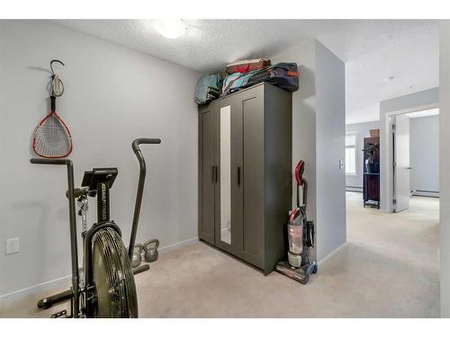 3324-4641 128 Avenue Ne, Calgary, AB - Indoor Photo Showing Gym Room