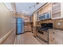 102-1530 16 Avenue Sw, Calgary, AB  - Indoor Photo Showing Kitchen 