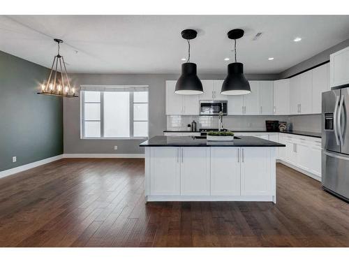 1734 25 Avenue Sw, Calgary, AB - Indoor Photo Showing Kitchen With Stainless Steel Kitchen