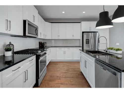 1734 25 Avenue Sw, Calgary, AB - Indoor Photo Showing Kitchen With Stainless Steel Kitchen With Double Sink With Upgraded Kitchen