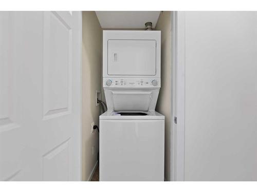 2409-755 Copperpond Boulevard Se, Calgary, AB - Indoor Photo Showing Laundry Room