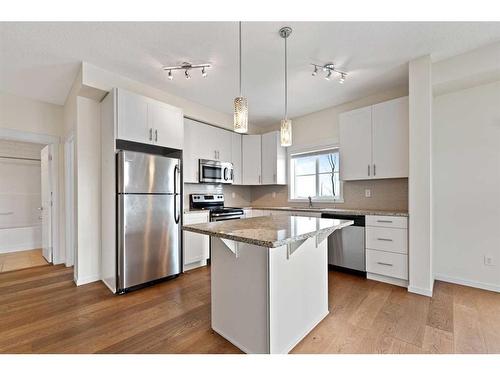 2409-755 Copperpond Boulevard Se, Calgary, AB - Indoor Photo Showing Kitchen With Stainless Steel Kitchen With Upgraded Kitchen