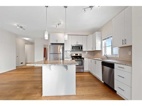 2409-755 Copperpond Boulevard Se, Calgary, AB - Indoor Photo Showing Kitchen With Stainless Steel Kitchen With Upgraded Kitchen