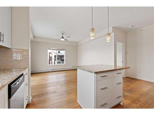 2409-755 Copperpond Boulevard Se, Calgary, AB - Indoor Photo Showing Kitchen With Upgraded Kitchen