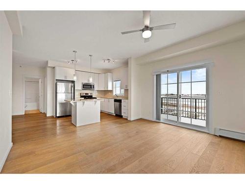 2409-755 Copperpond Boulevard Se, Calgary, AB - Indoor Photo Showing Kitchen With Stainless Steel Kitchen With Upgraded Kitchen