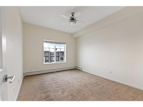 2409-755 Copperpond Boulevard Se, Calgary, AB - Indoor Photo Showing Other Room