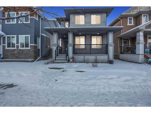 2469 Ravenswood View Se, Airdrie, AB - Outdoor With Deck Patio Veranda With Facade