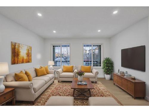 2469 Ravenswood View Se, Airdrie, AB - Indoor Photo Showing Living Room