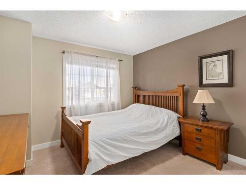 235 Rockyspring Grove Nw, Calgary, AB - Indoor Photo Showing Bedroom