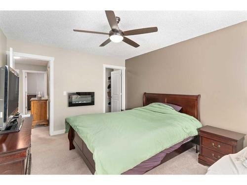 235 Rockyspring Grove Nw, Calgary, AB - Indoor Photo Showing Bedroom