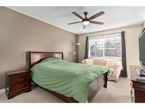 235 Rockyspring Grove Nw, Calgary, AB - Indoor Photo Showing Bedroom