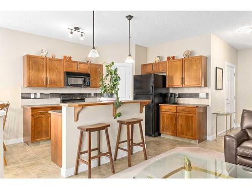 235 Rockyspring Grove Nw, Calgary, AB - Indoor Photo Showing Kitchen