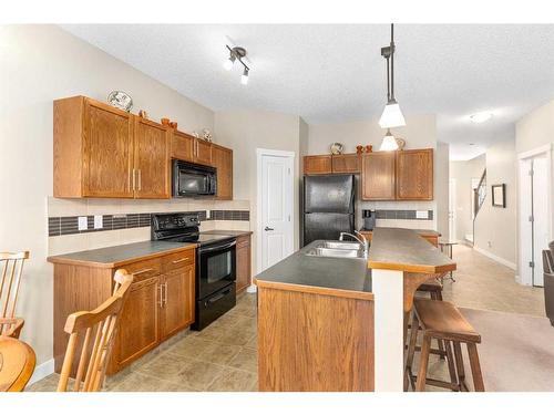 235 Rockyspring Grove Nw, Calgary, AB - Indoor Photo Showing Kitchen