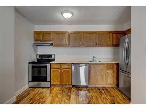 705-9800 Horton Road Sw, Calgary, AB - Indoor Photo Showing Kitchen With Stainless Steel Kitchen