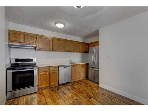 705-9800 Horton Road Sw, Calgary, AB - Indoor Photo Showing Kitchen With Stainless Steel Kitchen