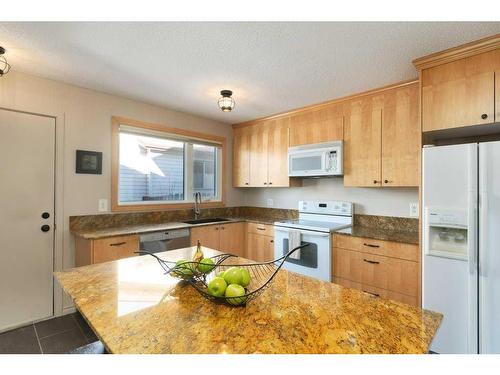 16 Cedardale Rise Sw, Calgary, AB - Indoor Photo Showing Kitchen