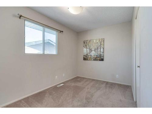 16 Cedardale Rise Sw, Calgary, AB - Indoor Photo Showing Other Room