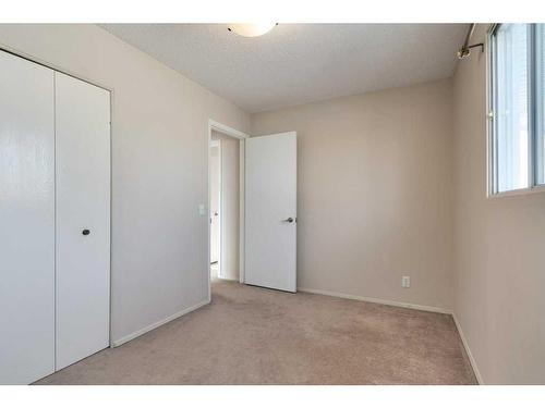 16 Cedardale Rise Sw, Calgary, AB - Indoor Photo Showing Other Room