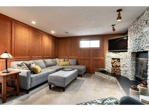 16 Cedardale Rise Sw, Calgary, AB - Indoor With Fireplace