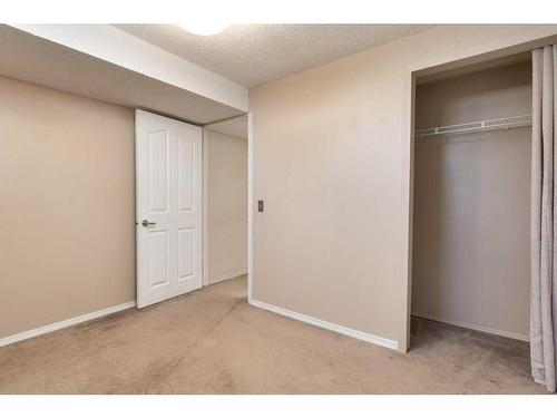 16 Cedardale Rise Sw, Calgary, AB - Indoor Photo Showing Other Room