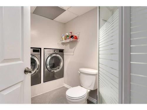 16 Cedardale Rise Sw, Calgary, AB - Indoor Photo Showing Laundry Room