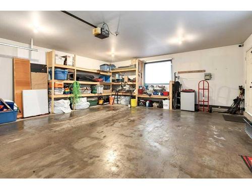 16 Cedardale Rise Sw, Calgary, AB - Indoor Photo Showing Garage