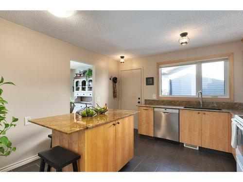 16 Cedardale Rise Sw, Calgary, AB - Indoor Photo Showing Kitchen