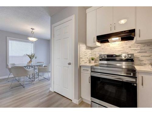 80 Chaparral Ridge Circle Se, Calgary, AB - Indoor Photo Showing Kitchen With Upgraded Kitchen