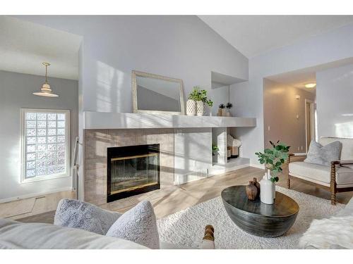 80 Chaparral Ridge Circle Se, Calgary, AB - Indoor Photo Showing Living Room With Fireplace