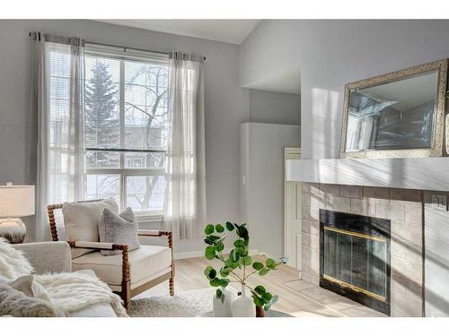 80 Chaparral Ridge Circle Se, Calgary, AB - Indoor Photo Showing Living Room With Fireplace