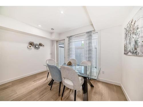 103-1632 20 Avenue Nw, Calgary, AB - Indoor Photo Showing Dining Room