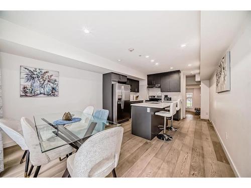 103-1632 20 Avenue Nw, Calgary, AB - Indoor Photo Showing Dining Room