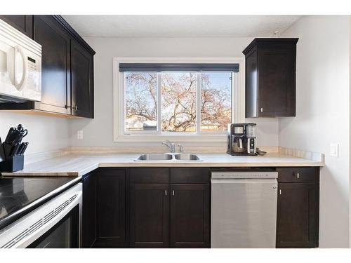 92 Abergale Way Ne, Calgary, AB - Indoor Photo Showing Kitchen With Double Sink