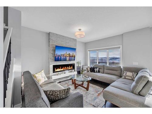 17 Cornerstone Parade Ne, Calgary, AB - Indoor Photo Showing Living Room With Fireplace