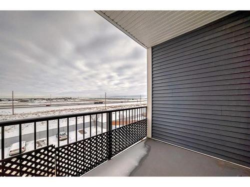 1408-755 Copperpond Boulevard Se, Calgary, AB - Outdoor With Balcony With Exterior