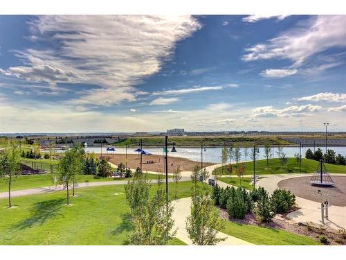 257 Masters Crescent Se, Calgary, AB - Outdoor With Body Of Water With View