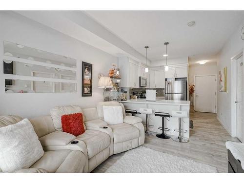 122-20 Seton Park Se, Calgary, AB - Indoor Photo Showing Living Room